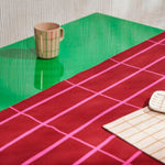 Marimekko TIILISKIVI Tablecloth red on the table