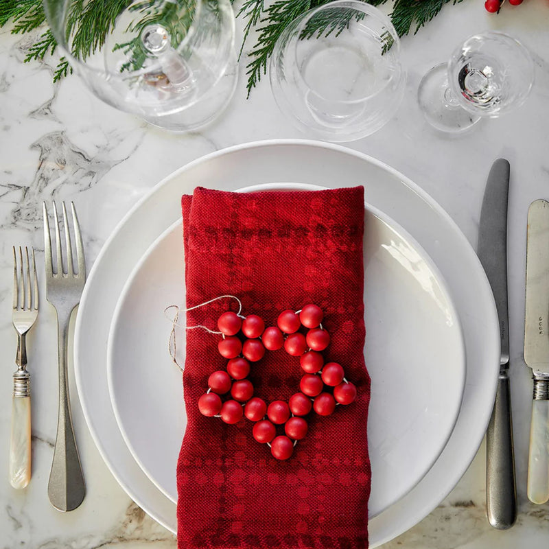 Aarikka HELMI Linen-Cotton Towel on a plate red