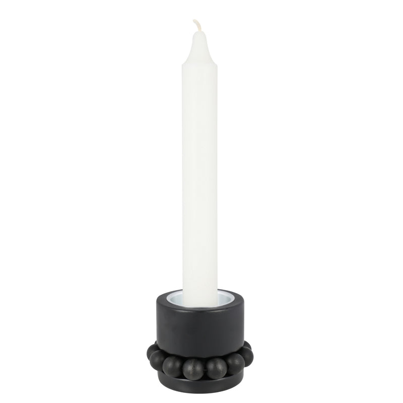 Aarikka black PRINSESSA Tea Light Candle Holder (2") with a candle