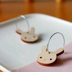 Rae Factory PUPU birch wood Earrings in white on a dish