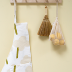 Kauniste Grey ONNI Linen - Cotton Apron hanging off the wall
