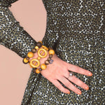 Aarikka KAISA Bracelet in yellow and green on a model 