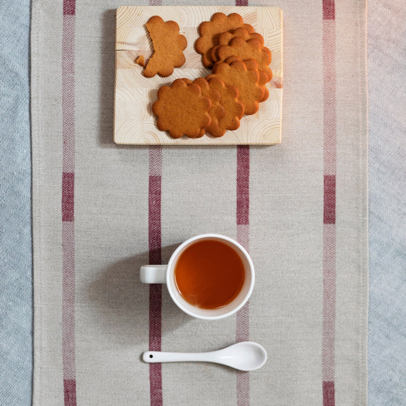 Lapuan Kankurit Linen-Bordeaux Color LINNEA 100% Linen Placemat on the table with gingerbreads and tea