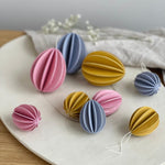 Small and large Lovi Easter Eggs mixed in pastel hues